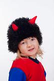 portrait of a cute boy with cap and horns isolated on white