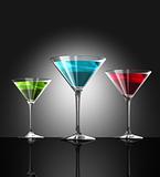 red, green and blue cocktail glasses