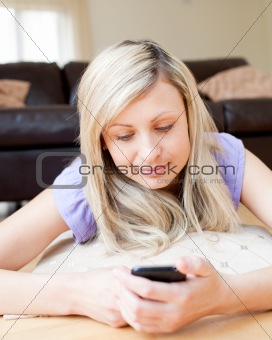 Beautiful woman sending a text 