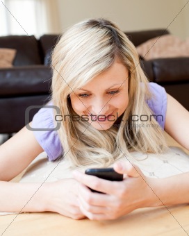 Bright woman sending a text 