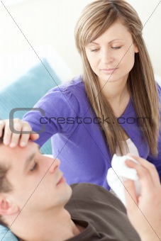 Bright woman taking care of her husband