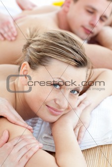 Happy couple having a massage
