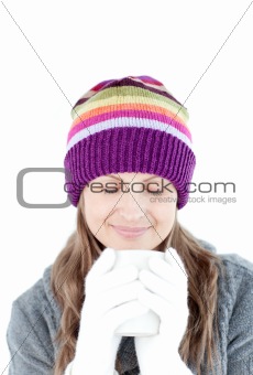 Portrait of concentrated woman against a white background