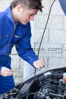 Professional man repairing a car 