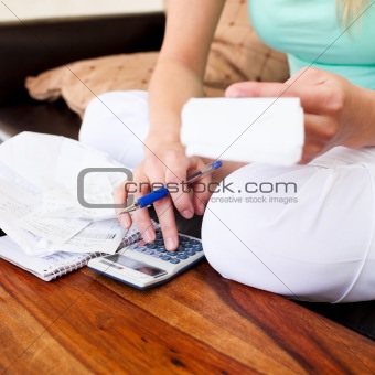 Young woman doing accountancy