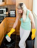 Confident housewife cleaning 