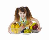 Little girl with big bunch of fruit