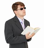 Blind young man with book isolated on white background