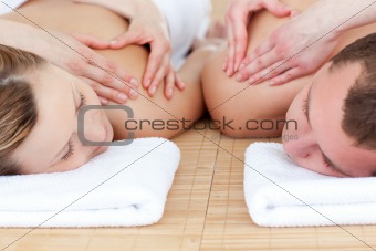 Young couple receiving a back massage 