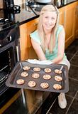 Happy housewife preparing cookies