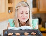 Delighted housewife preparing cookies