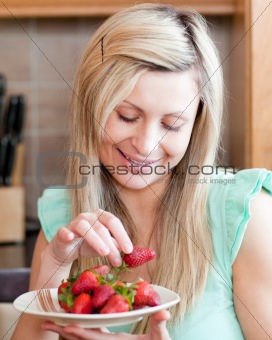 Positive woman eating fruits 