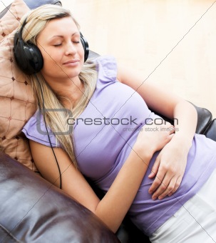Sleeping woman using headphones 