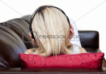 Young woman using headphones 
