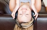 Calm woman using headphones 
