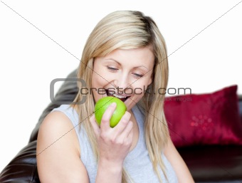 Bright woman eating an apple