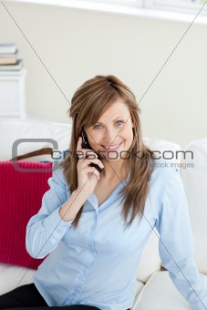 Attractive businesswoman using a mobile phone