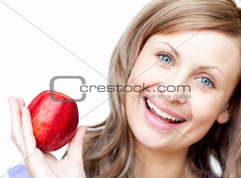 Healthy woman holding an apple 
