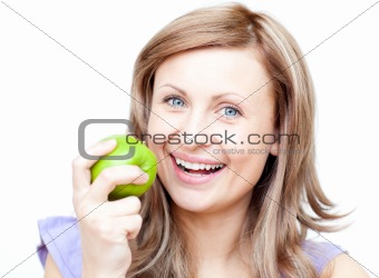 Delighted woman holding an apple 