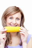 Attractive woman holding a corn 
