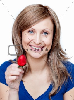 Beautiful woman eating strawberries 