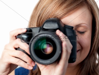 Beautiful woman using a camera 