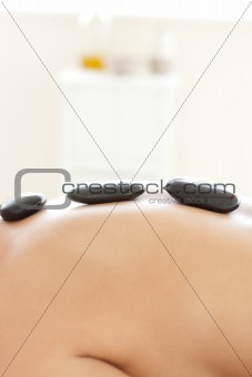 Caucasian woman lying on a massage table 
