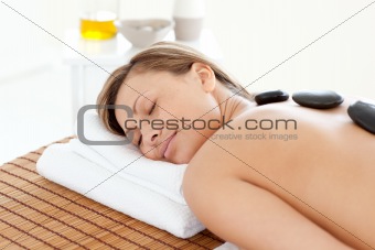 Beautiful woman relaxing on a massage table 