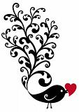 ornamental bird with red heart