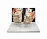 Man Handing Stacks of Money Through Laptop Screen Isolated on a White Background.