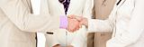 Close-up of business partners shaking hands