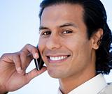 Close-up of a handsome businessman talking on phone