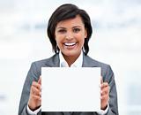 Smiling ethnic businesswoman holding a white card