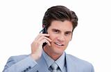 Portrait of a handsome businessman talking on phone