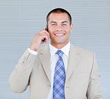 Self-assured businessman talking on phone