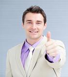 Positive businessman with a thumb up