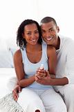 Smiling Afro-american couple finding out results of a pregnancy 