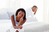 Disconcerted couple finding out results of a pregnancy test 