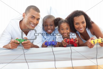 Animated family playing video game lying down on bed