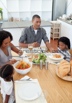 Loving family dining together