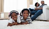 Cute siblings listening music