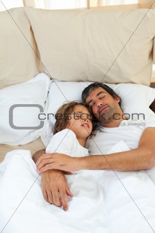 Father and son sleeping together 