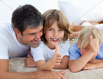 Affectionate father with his children having fun