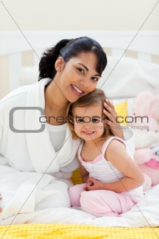 Portrait of a smiling mother and her daughter