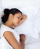 Upset woman sleeping separately of her husband