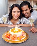 Attractive woman celebrating her birthday with her husband