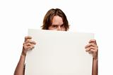 Fun Young Man Holding Blank White Sign Isolated on a White Background.