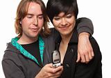 Diverse Couple Using Cell Phone Isolated on a White Background.