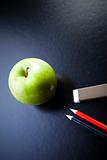 Apple on a chalkboard - healthy breakfast at school
