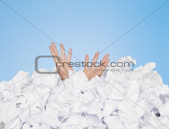 Human buried in papers